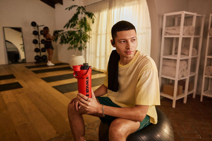 Stanley Activate Shaker Bottle 20 oz | Leakproof Insulated Stainless Steel Shaker Cup | Base Storage and Twist On Fast Flow Lid | Protein Shakes and Pre Workout Powder | BPA-Free | Chili Red